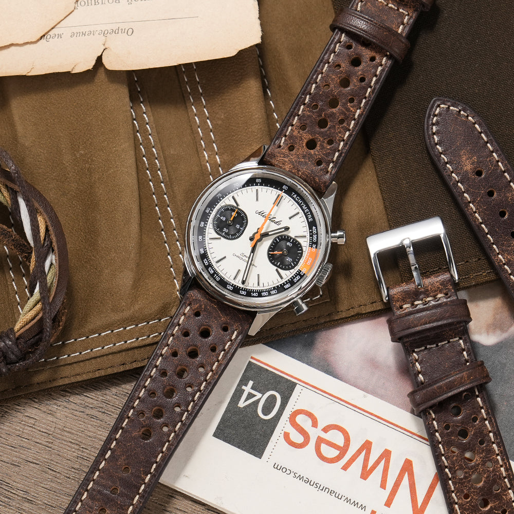 Distressed brown leather racing watch strap with contrast stitching and perforations