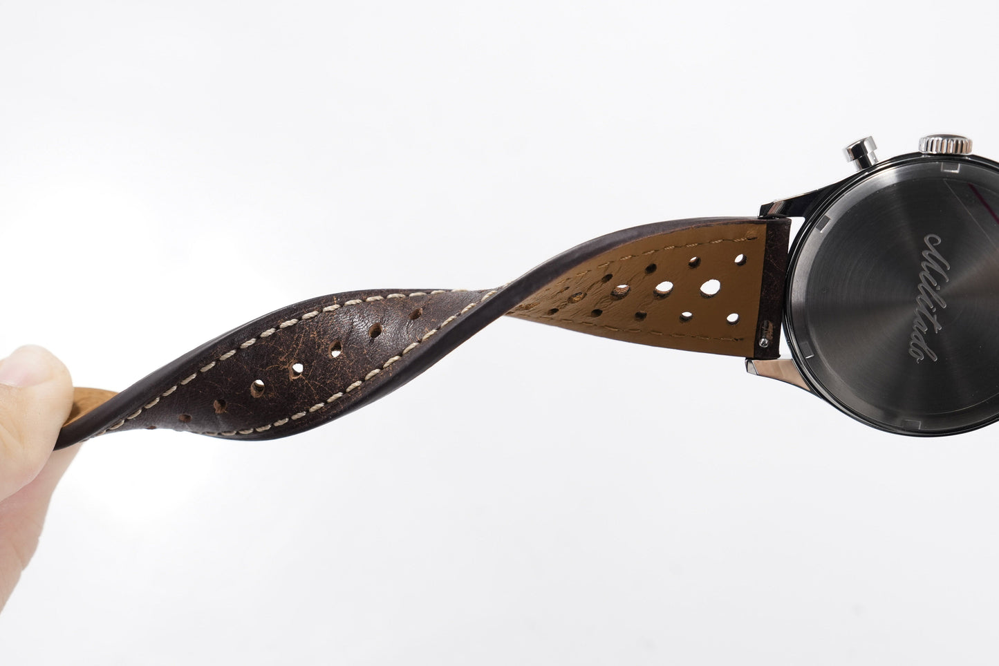 Flexible brown waxed leather Rally strap showing perforated construction and underside