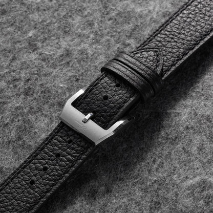 Back view of 20mm black pebbled leather watch strap with tan lining