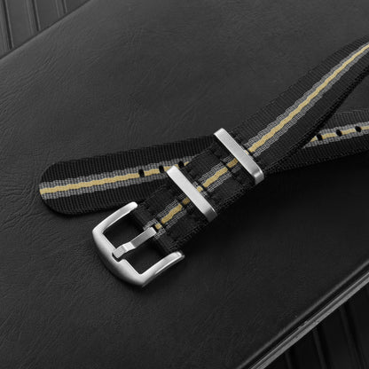 Striped nylon NATO watch strap with brushed silver-tone buckle and keepers